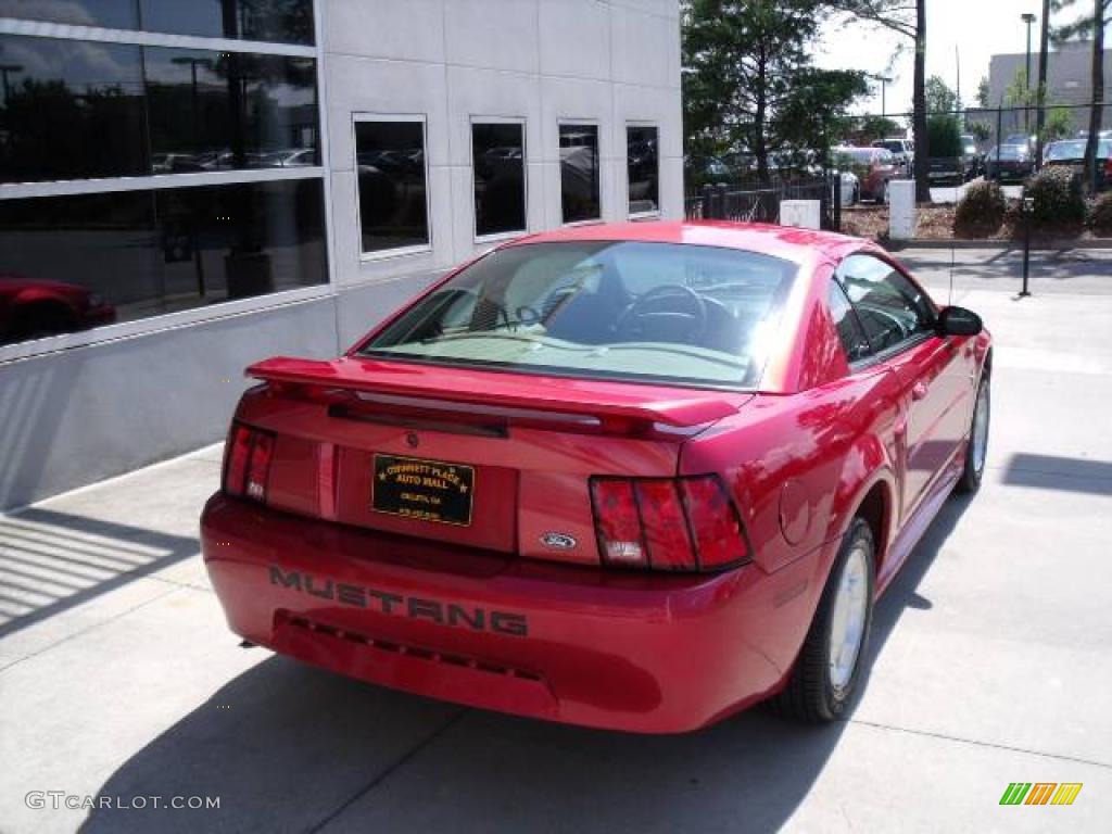 2001 Mustang V6 Coupe - Laser Red Metallic / Medium Parchment photo #8