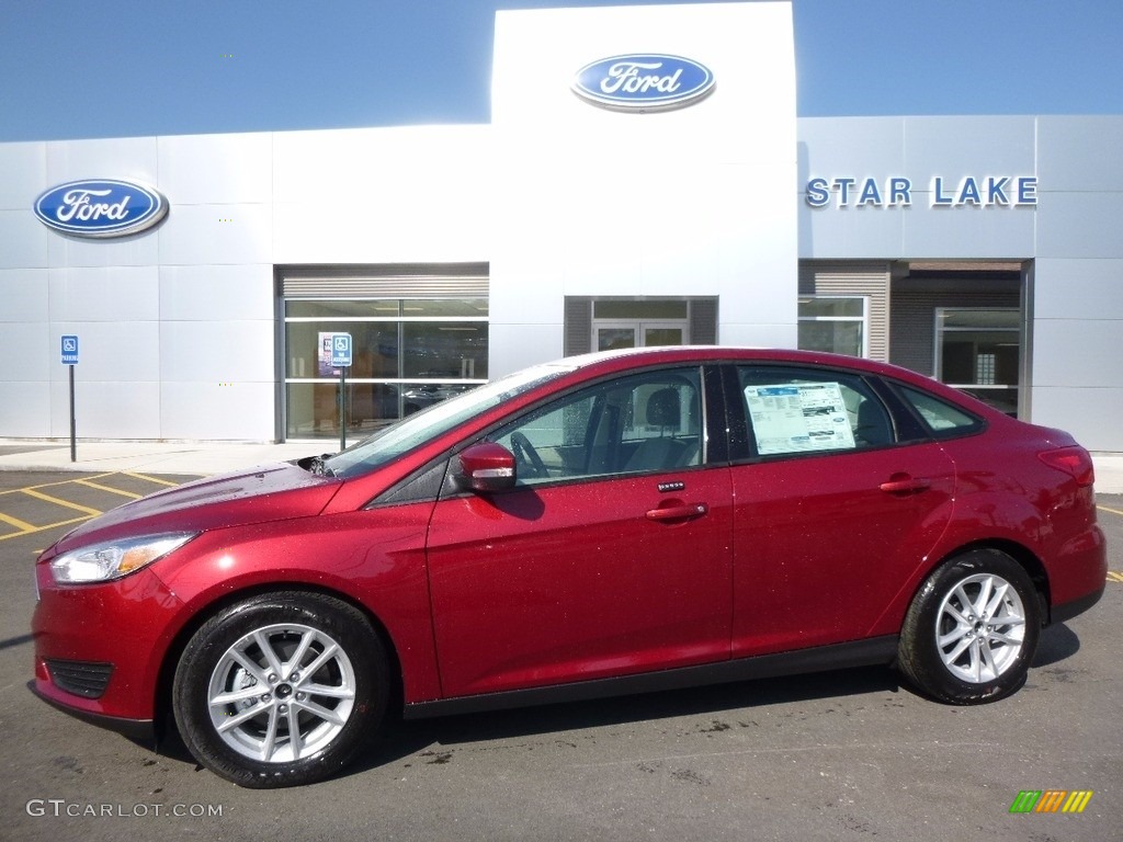 2016 Focus SE Sedan - Ruby Red / Medium Light Stone photo #1