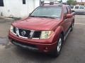 2006 Red Brawn Nissan Frontier LE Crew Cab  photo #2