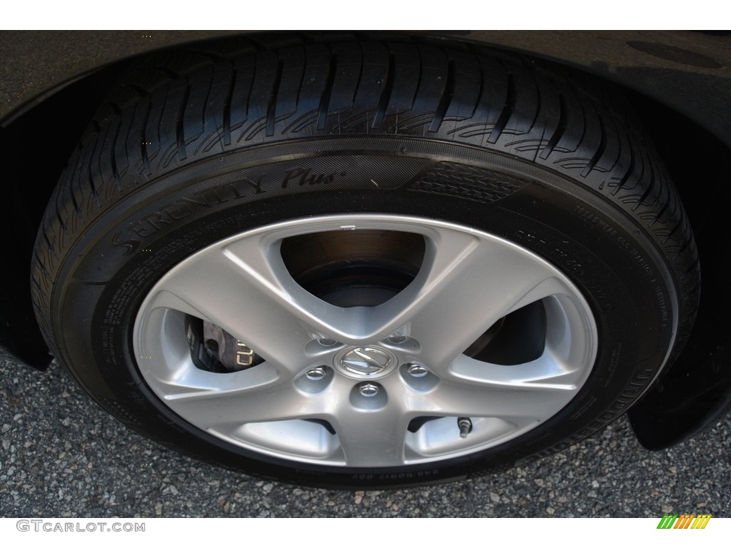 2005 RL 3.5 AWD Sedan - Nighthawk Black Pearl / Parchment photo #31