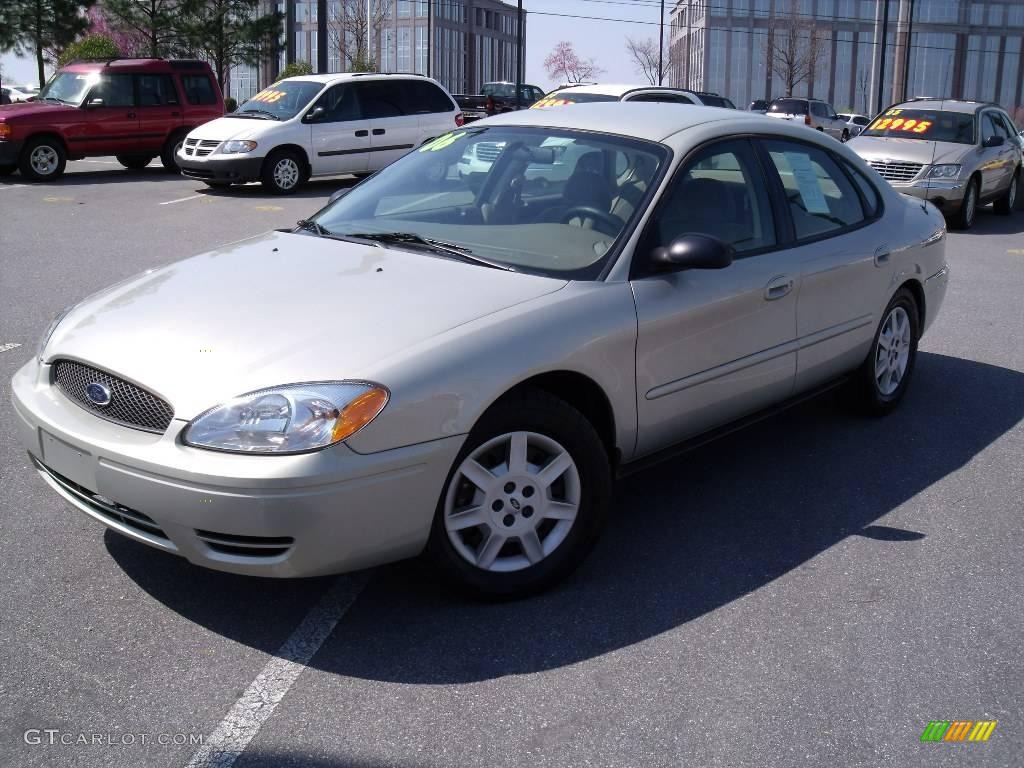 Silver Frost Metallic Ford Taurus