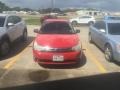 2008 Vermillion Red Ford Focus SE Sedan #113651050