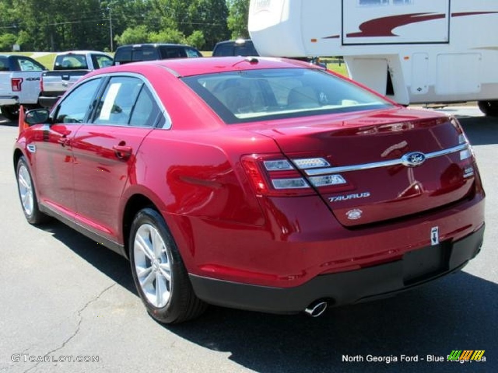 2016 Taurus SEL - Ruby Red / Dune photo #3