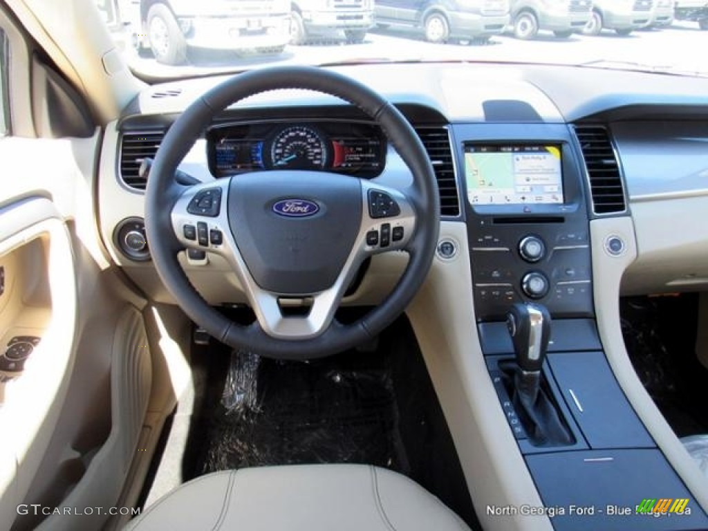 2016 Taurus SEL - Ruby Red / Dune photo #16