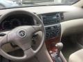 2006 Impulse Red Pearl Toyota Corolla LE  photo #8