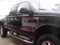 2002 Black Ford F350 Super Duty XLT SuperCab 4x4  photo #9