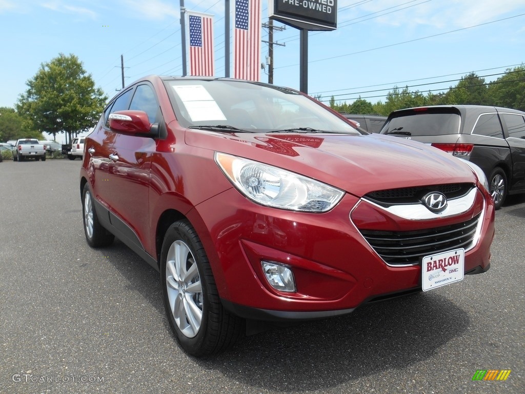 2010 Tucson Limited AWD - Garnet Red / Taupe photo #1