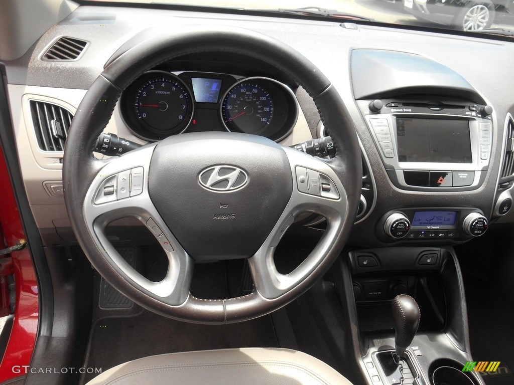 2010 Tucson Limited AWD - Garnet Red / Taupe photo #11