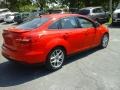 2015 Race Red Ford Focus SE Sedan  photo #4
