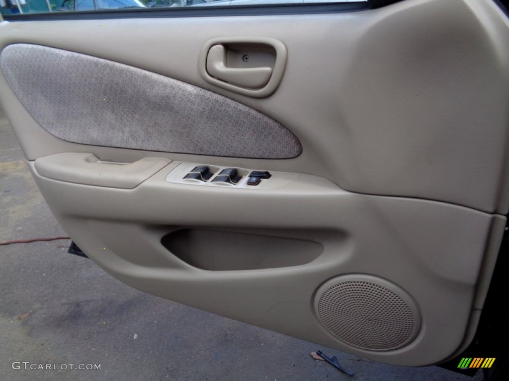 1999 Corolla CE - Satin Black Metallic / Pebble Beige photo #38