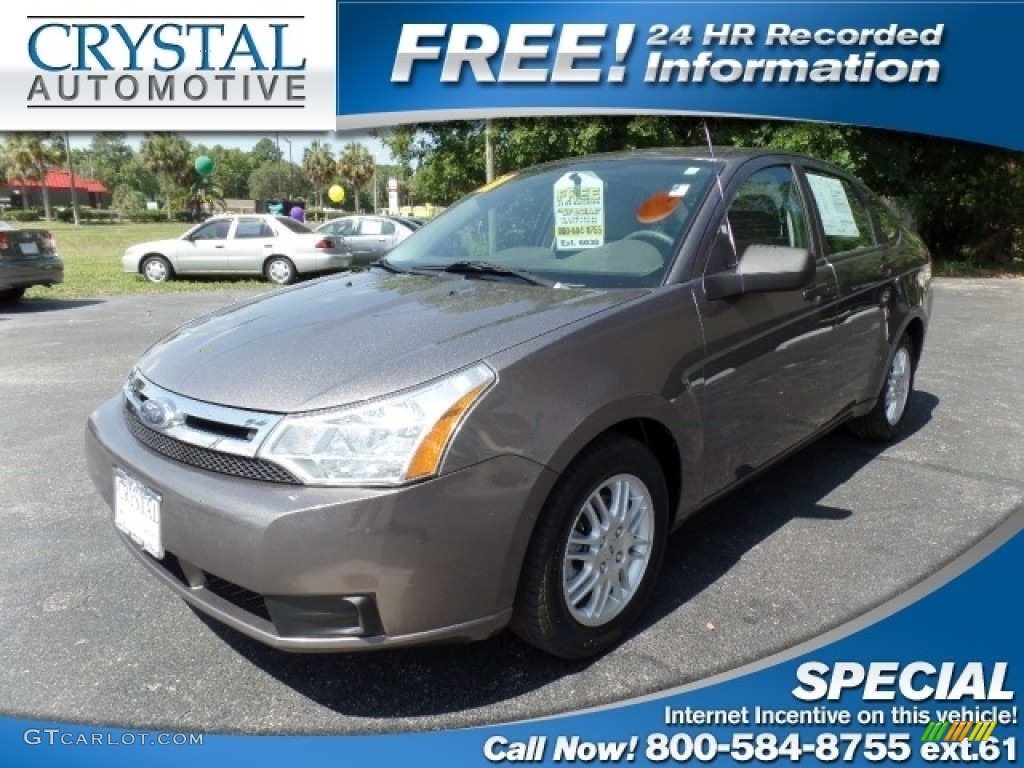2011 Focus SE Sedan - Sterling Gray Metallic / Medium Stone photo #1