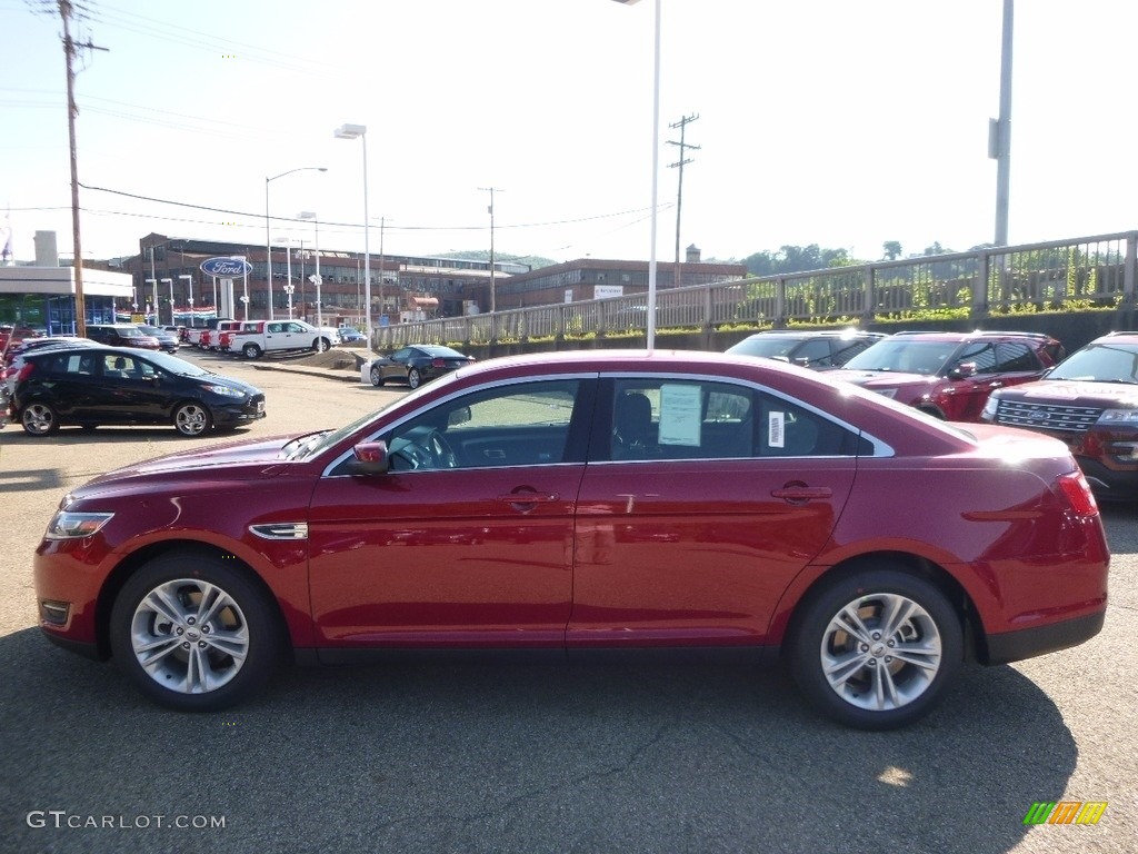 2016 Taurus SEL - Ruby Red / Charcoal Black photo #6