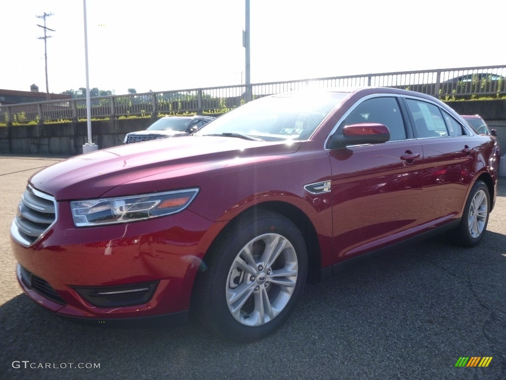 2016 Taurus SEL - Ruby Red / Charcoal Black photo #7