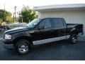 2005 Black Ford F150 XLT SuperCrew  photo #1