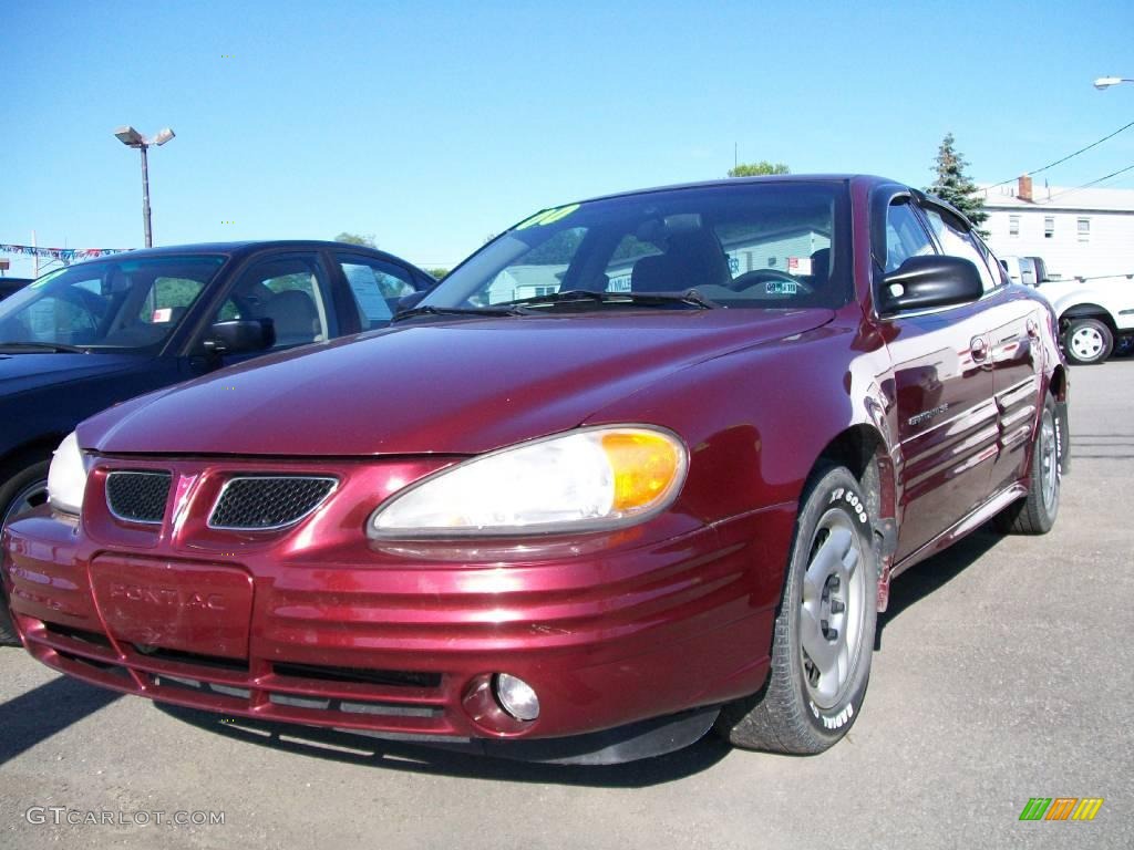 2000 Grand Am SE Sedan - Redfire Metallic / Dark Pewter photo #1