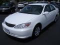 Super White - Camry LE Photo No. 1