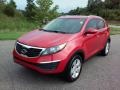 2011 Signal Red Kia Sportage LX AWD  photo #2