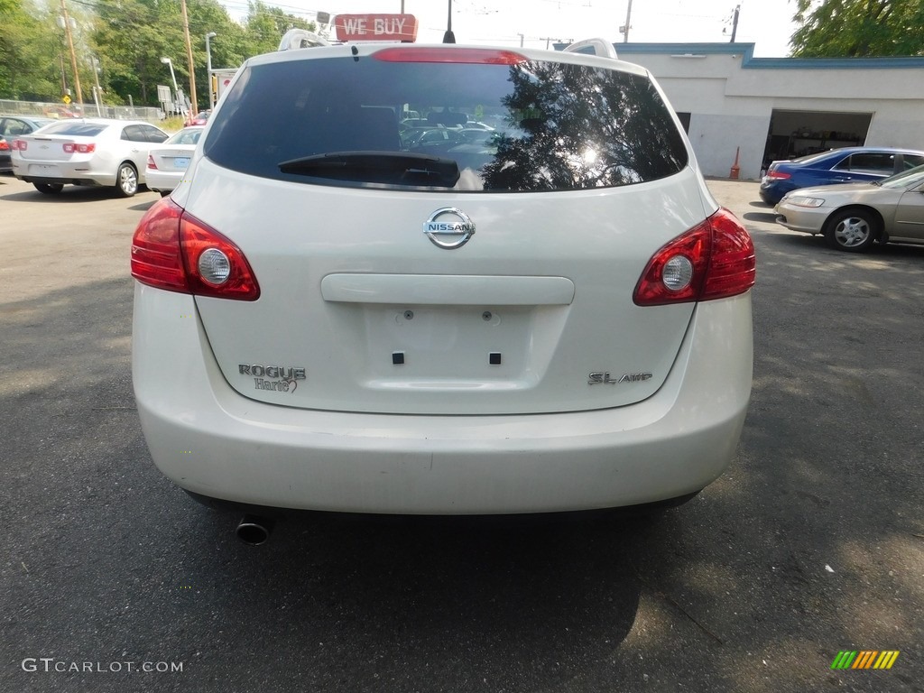 2010 Rogue SL AWD - Phantom White / Black photo #6