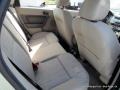 2011 Natural Neutral Metallic Ford Focus SE Sedan  photo #30