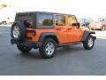 2012 Crush Orange Jeep Wrangler Unlimited Sport 4x4  photo #2