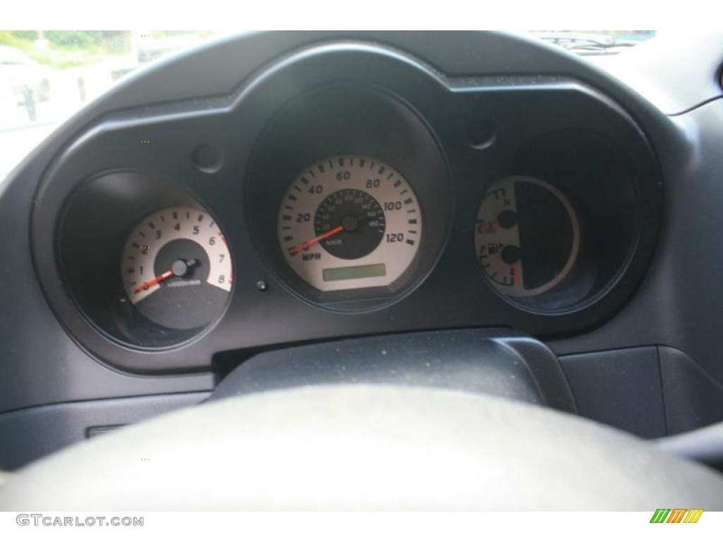 2004 Xterra XE 4x4 - Solar Yellow / Gray photo #23