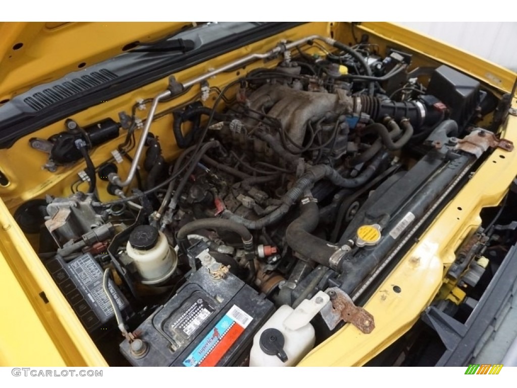 2004 Xterra SE 4x4 - Solar Yellow / Charcoal photo #47