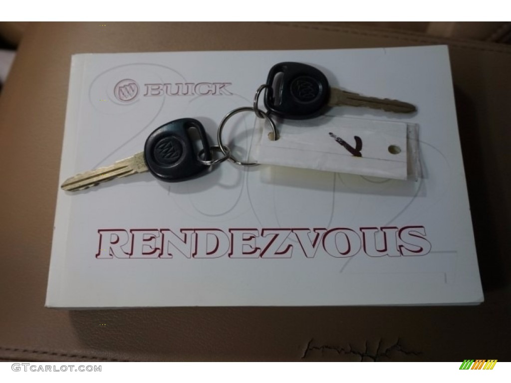 2002 Rendezvous CXL AWD - Medium Red / Medium Oak photo #47