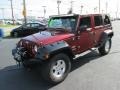 2008 Red Rock Crystal Pearl Jeep Wrangler Unlimited Sahara 4x4  photo #2
