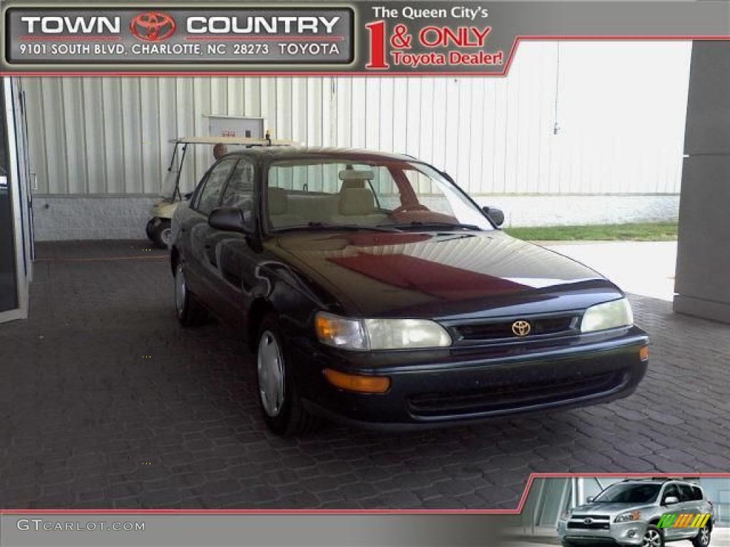 1997 Corolla CE - Dark Emerald Pearl Green Metallic / Beige photo #1