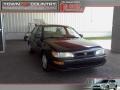 Dark Emerald Pearl Green Metallic 1997 Toyota Corolla CE