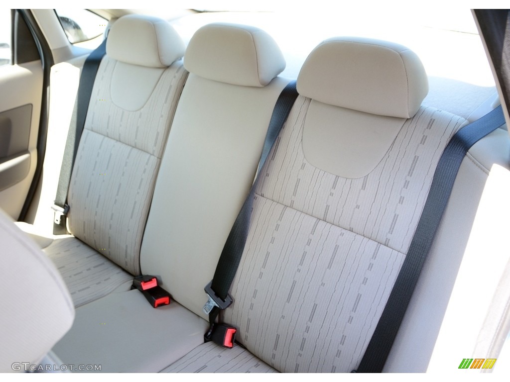 2009 Focus SE Sedan - Light Ice Blue Metallic / Medium Stone photo #12