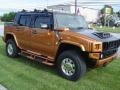 2006 Fusion Orange Hummer H2 SUT  photo #1