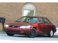1999 Vintage Red Pearl Toyota Camry LE #115955952