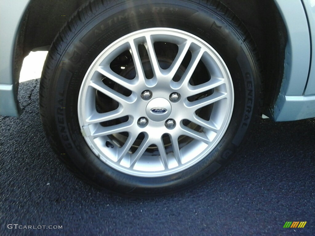 2009 Focus SE Sedan - Light Ice Blue Metallic / Medium Stone photo #6