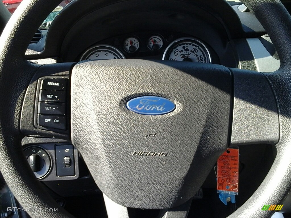 2009 Focus SE Sedan - Light Ice Blue Metallic / Medium Stone photo #11