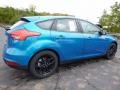 2016 Blue Candy Ford Focus SE Hatch  photo #2