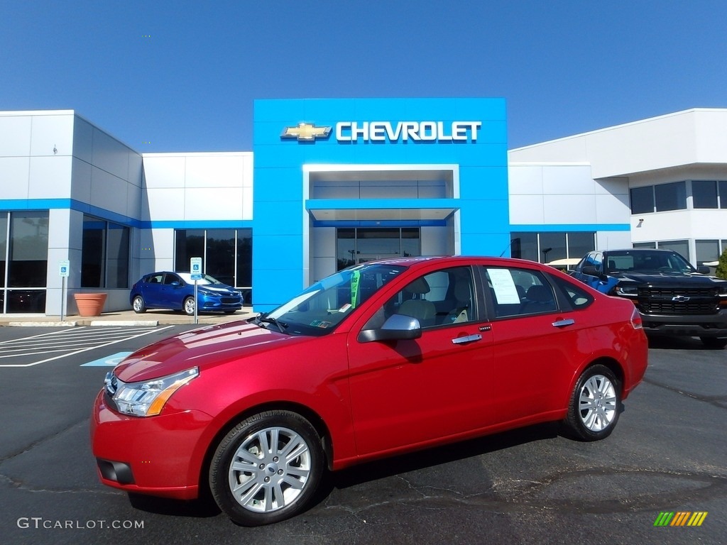 2010 Focus SEL Sedan - Sangria Red Metallic / Charcoal Black photo #1