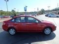 2010 Sangria Red Metallic Ford Focus SEL Sedan  photo #9