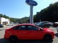 2016 Race Red Ford Focus SE Sedan  photo #1