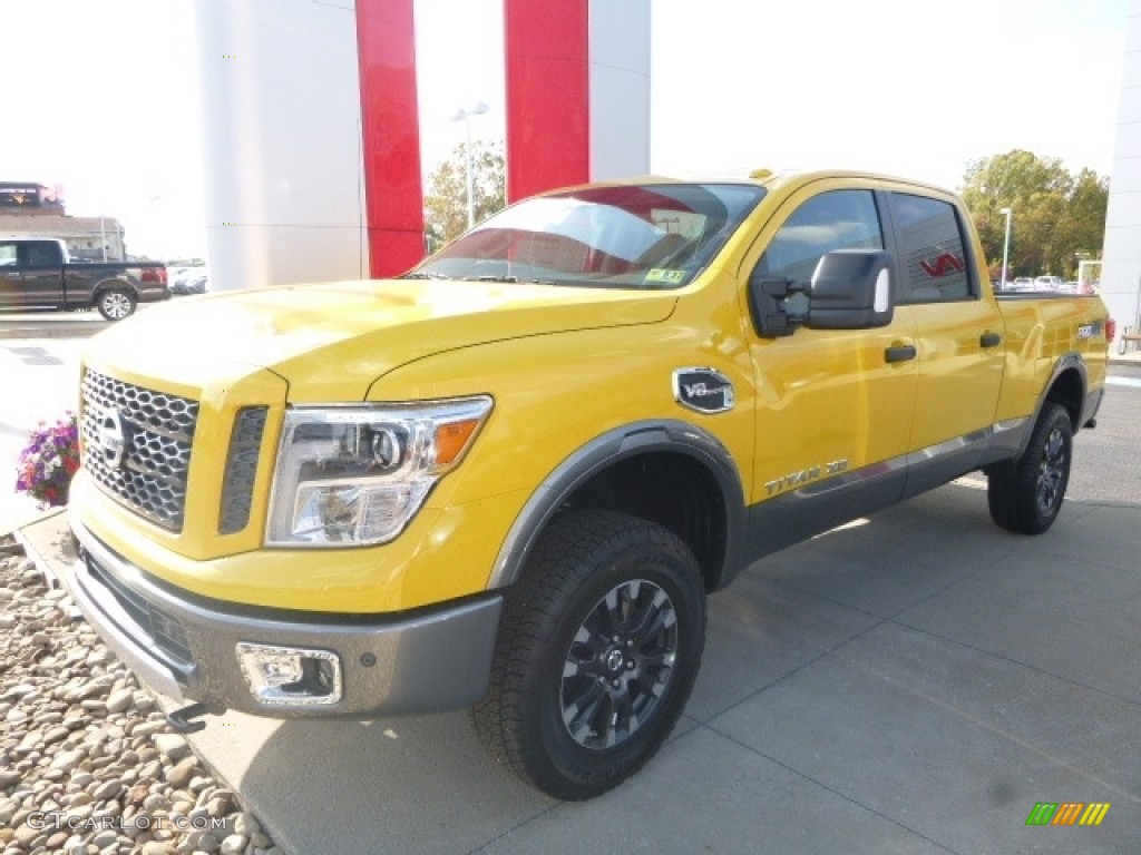 Solar Flare Yellow 2017 Nissan TITAN XD PRO-4X Crew Cab 4x4 Exterior Photo #116471050