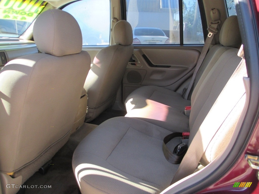 2002 Grand Cherokee Laredo 4x4 - Dark Garnet Red Pearlcoat / Sandstone photo #12