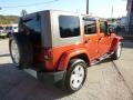 2009 Sunburst Orange Pearl Jeep Wrangler Unlimited Sahara 4x4  photo #6