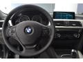 Black 2017 BMW 3 Series 320i Sedan Dashboard