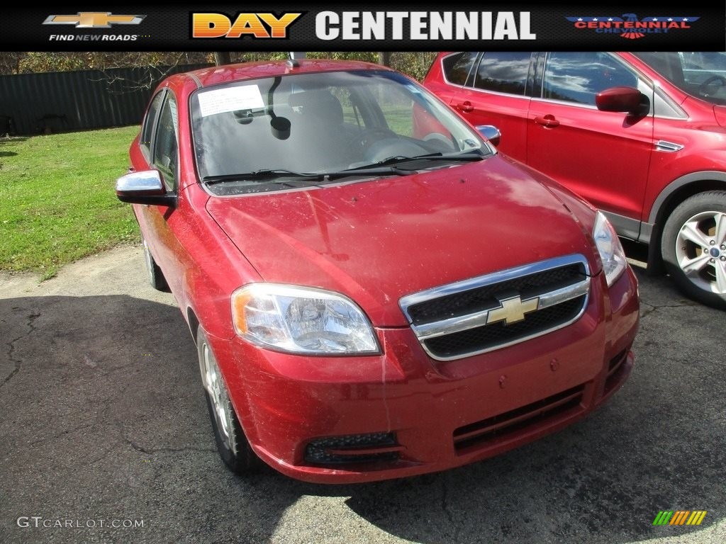2011 Aveo LT Sedan - Victory Red / Charcoal photo #1