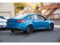 2016 Blue Candy Ford Focus SE Sedan  photo #3