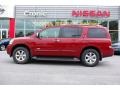 2008 Red Brawn Nissan Armada SE  photo #1