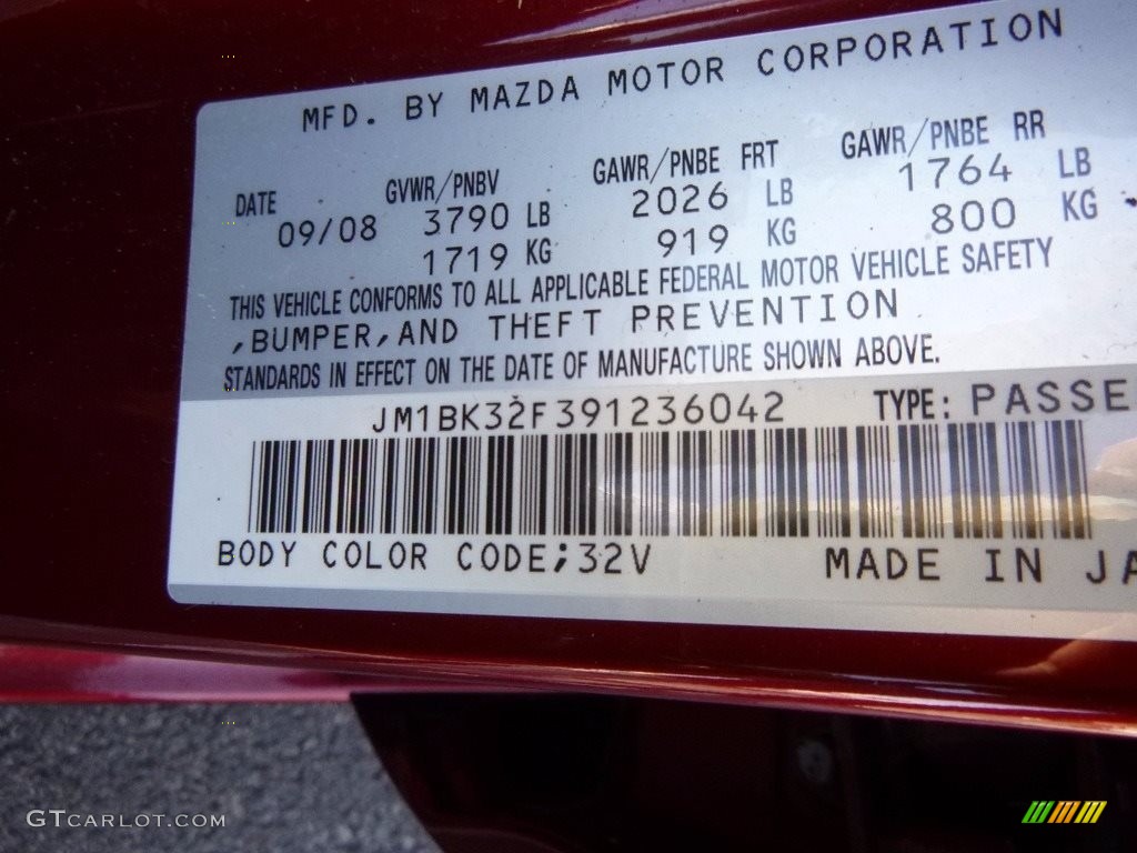 2009 MAZDA3 i Touring Sedan - Copper Red Mica / Black photo #15