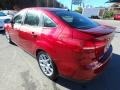 2015 Race Red Ford Focus SE Sedan  photo #4