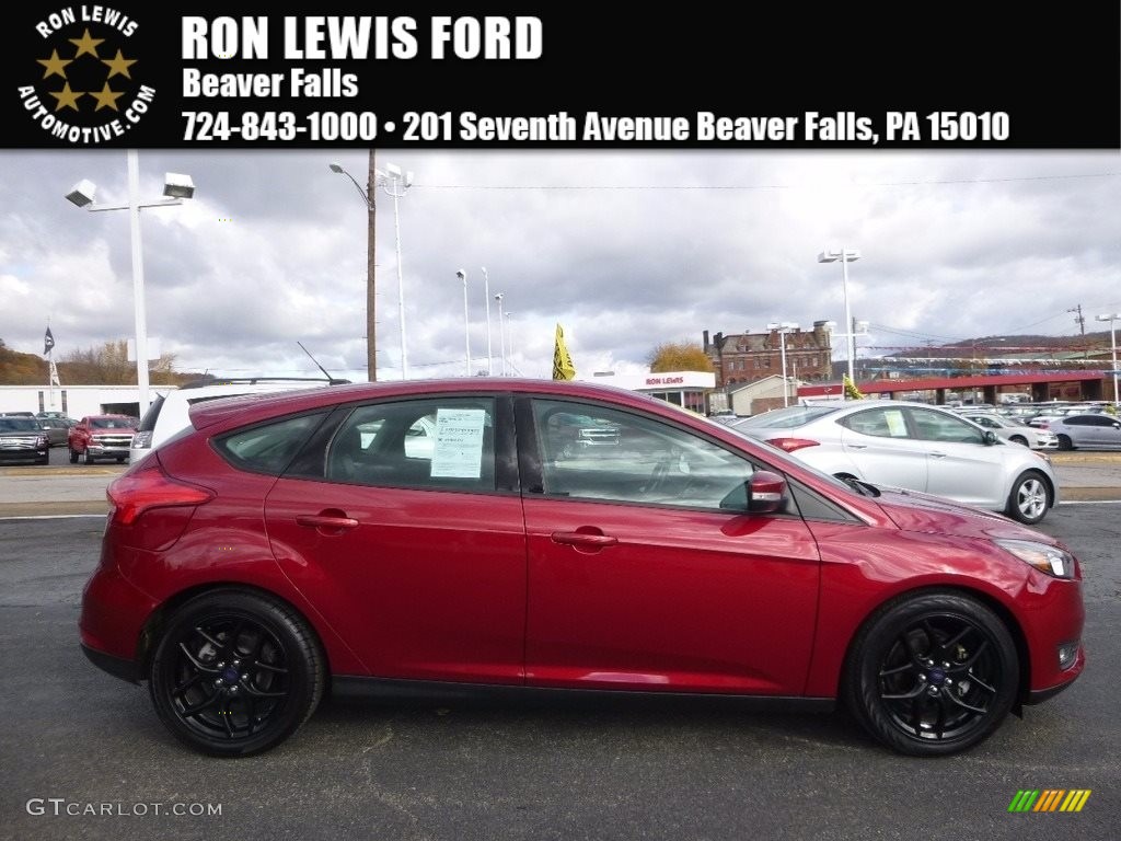 2016 Focus SE Hatch - Ruby Red / Charcoal Black photo #1