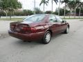 1999 Vintage Red Pearl Toyota Camry CE  photo #5